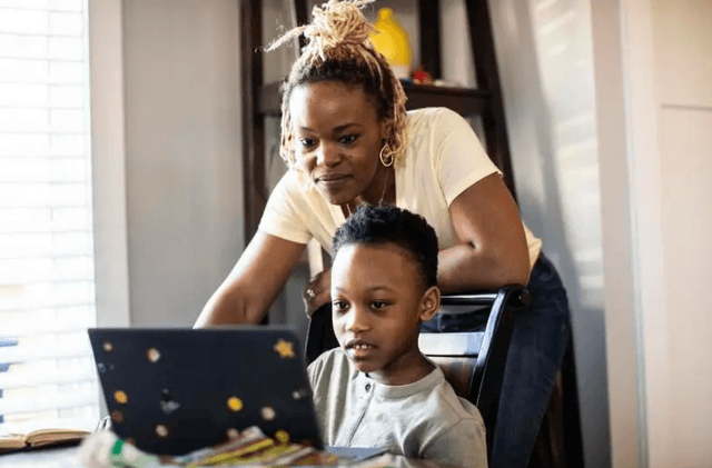 A family learning together at home