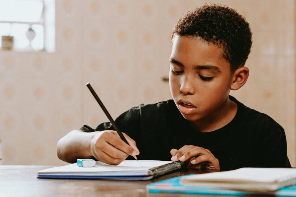 A-child-uses-a-dedicated-learning-space-as-part-of-their-homeschool-daily-routine